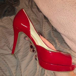 Red high heels barely worn